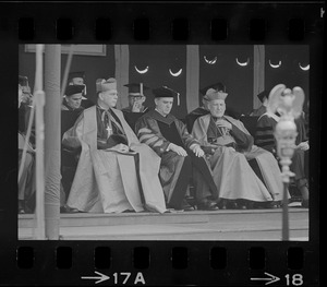 Terence Cardinal Cooke of New York, left, Boston College President W. Sevey Joyce, middle, and Richard Cardinal Cushing, right, seated on stage at Boston College commencement exercises
