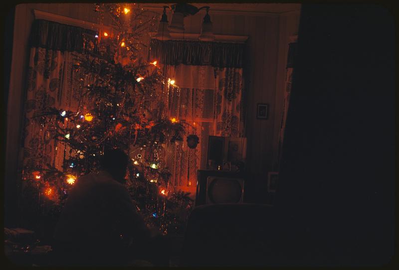 Warren Mitchell with tree, Christmas