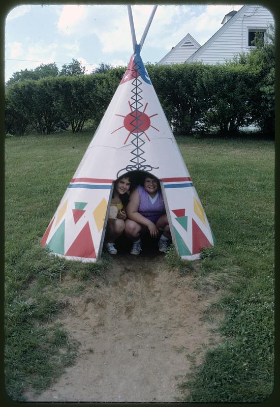 Children posing in tepee, Mohawk Tepee souvenir shop, Charlemont, Massachusetts