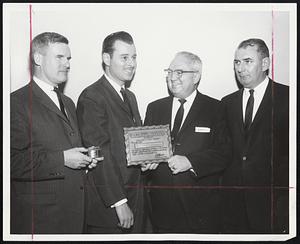 Safe Driving Campaign won awards for Herbert A. Abramson, president of Silver Lake Motors, Newton. From left: Carton Conway, Dodge’s New England manager; Abramson; Registrar of Motor Vehicles Clement Riley, present plaque; and George Buttrick, Dodge district manager.