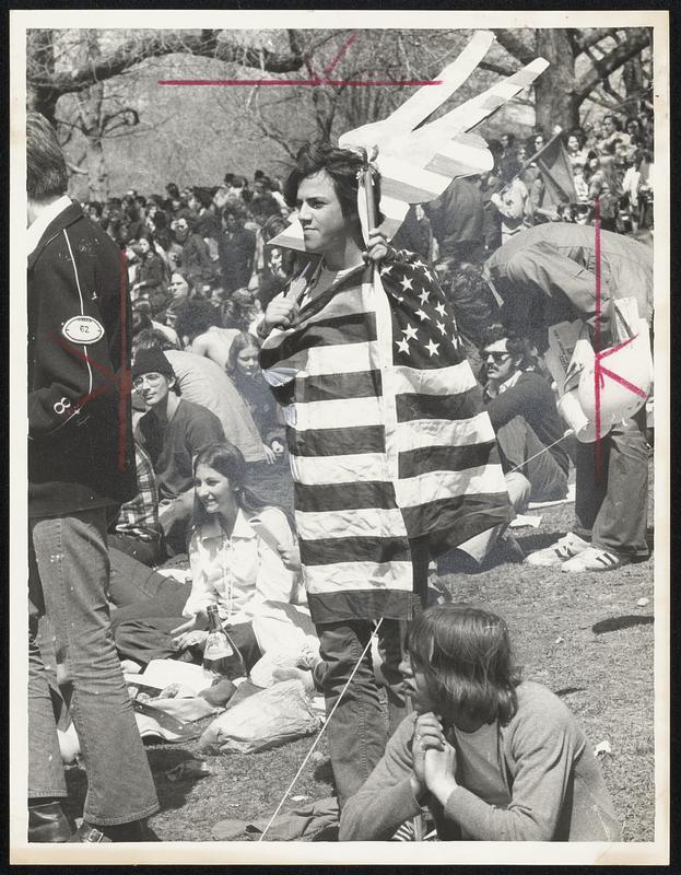 Attention-Getter at yesterday's rally on the Common was this youth with American flag draped around him.