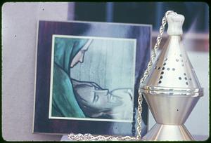 A picture of the Virgin Mary and Jesus Christ, an censer to the left