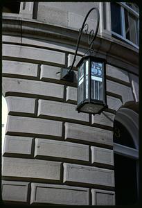 Lantern attached to the side of a building