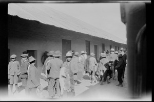 Peru, on the journey from Mollendo to Arequipa, Indians selling llama and alpaca skins at the station