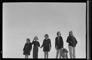 Group of five girls and dog