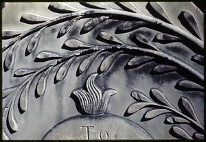 View of branch carving on headstone