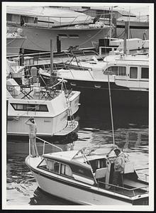 Neighborliness-On-Hudson. The small community of houseboats in New York’s City’s 79th Street Boat Basin is a special kind of ghetto. It is smaller than a city block, its tallest house only two stories high. Its residents work in the city by day and sleep on the Hudson River by night, people who have tried to escape New York and didn’t quite make it. They still share city problems – crowding, dirt and noise. But they have a unique vista of city life.