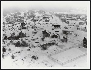 Snowy landscape with houses