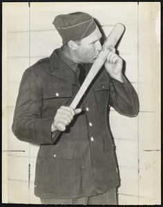 So Long, Old Pal - Red Ruffing of the Yankees donned an army uniform at Fort MacArthur, Calif., yesterday and kissed his favorite bat goodbye for the duration.