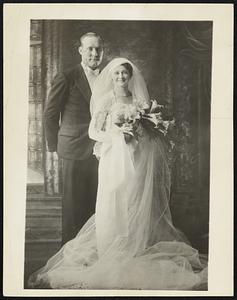Yankee Pitcher Weds. Charles Ruffing, New York Yankee pitcher, is shown here with his bride, the former Pauline Mulholland of Nokomis, Illinois. The couple was married at Nokomis Oct. 6.