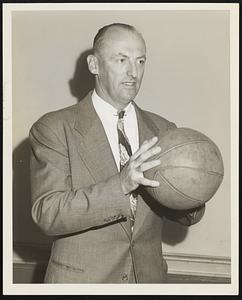 John "Honey" Russell new coach Boston Pro basketball teams at Boston Garden.