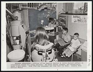 Relaxed Atmosphere -- Offices of Los Angeles dentist H. Keith Packard reflect an orientation toward his young patients. He wears sports clothes, his receptionist wears a mini-skirt. Kids like the treatment and come back for more.