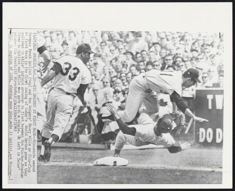 Los Angeles – Big Smashup At First Base – Minnesota second baseman Frank Quilici (top) and the Dodgers’ Maury Wills go flip-flop at first base in the first inning of today’s World Series game as they collided on Wills’ infield grounder to first baseman Don Mincher. Mincher threw to Quilici and Wills was safe with a single. At left is Twins’ pitcher Jim Grant.