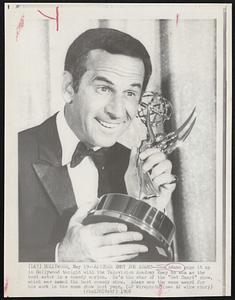 Another Emmy for Adams--Don Adams gags it up in Hollywood tonight with the Television Academy Emmy he won as the best actor in a comedy series. He's the star of the the "Get Smart" show, which was named the best comedy show. Adams won the same award for his work in the same show last year.