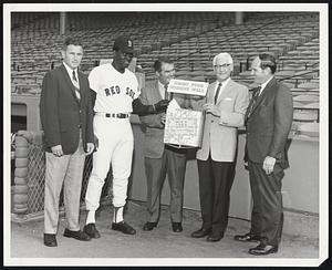 Winning Name for 1969 Plymouth Fury Convertible, donated to Jimmy Fund by New England Chrysler-Plymouth dealers, is drawn by Red Sox third baseman George Scott. From left are Tom Lamb, Chrysler dealer president; Scott; Ken Coleman, voice of Red Sox; Bill Lannin, Plymouth dealer president, and Bob Rheault, Chrysler-Plymouth division.