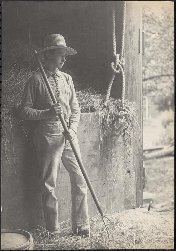 Young man with pitchfork