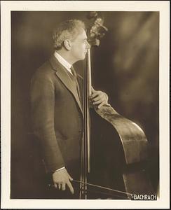 Serge Koussevitzky posed with a double bass