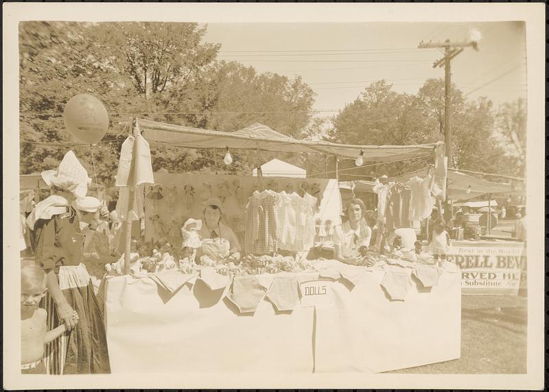 Doll and doll clothes booth, street fair