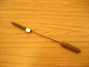 Long narrow metal tool