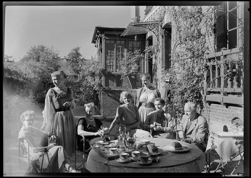 Group having tea in garden