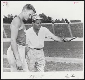 Fastest Human is Dave Sime of Duke University shown with his coach, Bob Chambers. The New Jersey athlete has run the 100-yard dash in 9.3, and is the United States hope in Olympic sprints.
