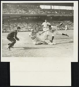 Cincinnati Reds win 1939 National League Pennant! Cincinnati, Ohio-The cinnati Reds today defeated the St. Louis Cardinals in the final game of their crucial series to win the 1939 National League pennant. Photo above shows Gutteridge of of the St. Louis Cardinals being called out by Umpire Pinelli in a close play at first base although the photo shows he has touched the bag before McCormick tagged him.
