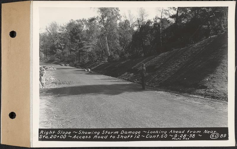 Contract No. 60, Access Roads to Shaft 12, Quabbin Aqueduct, Hardwick and Greenwich, right slope, showing storm damage, looking ahead from near Sta. 20+00, Greenwich and Hardwick, Mass., Sep. 28, 1938