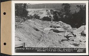 Contract No. 82, Constructing Quabbin Hill Road, Ware, looking back at ledge from Sta. 33+00, Ware, Mass., Jul. 5, 1939