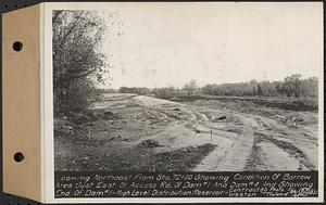 Contract No. 80, High Level Distribution Reservoir, Weston, looking northeast from Sta. 72+00 showing condition of borrow area just east of Access Road of dam 1 and dam 4 and showing end of dam 1, high level distribution reservoir, Weston, Mass., May 29, 1940