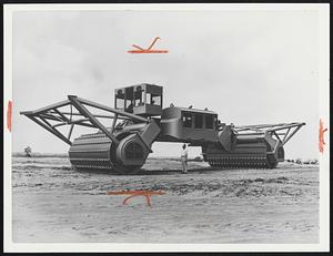 Meanest Machine-This huge tree-crusher can clear an acre of unproductive forest in 15 minutes. Designed and built by R. G. LeTourneau, Inc., of Longview, Tex., the brutal combination of mass and power can chew its way through a forest, ripping trees up by the roots, slapping them to the ground and finally smashing them to splinters for thorough burning. The monster is 75 feet long, 22 feet wide and 19 feet high. It weighs 150 tons. The maker believes it will be extremely useful clearing jungle in places such as Africa and South America. The machine costs almost $200,000.