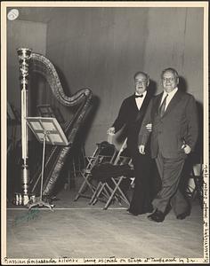 Russian Ambassador Litvinov being escorted on stage at Tanglewood by Dr. Koussevitzky at benefit concert 1942