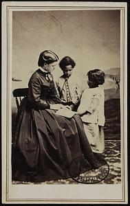 Lizzie Langford and her pupils James Henry Brooks and Rasella Glasper