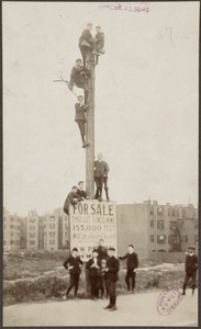 Young fans climb pole next to Huntington Avenue Grounds, 1903 World Series