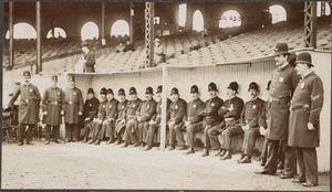 Boston Policemen pose in dugout at the Huntington Avenue Grounds, 1903 World Series