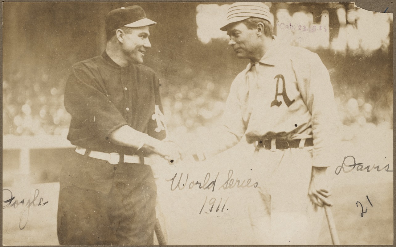 Larry Doyle and Harry Davis shake hands before the first game of the 1911 World Series