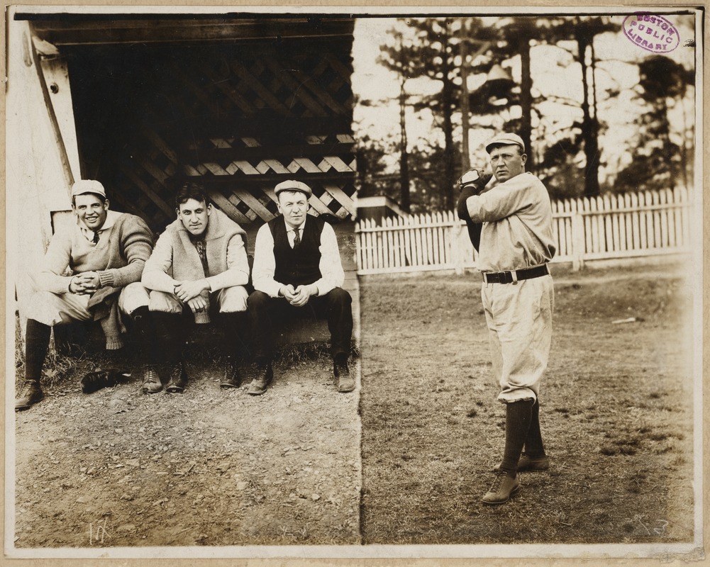 Cy Young Pitching/spectators in dugout