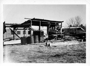 Gasoline Engine to Run the Daniels Mill. This Mill Was Moved to Aggie Where it Sawed; School Lumber 60,000 Ft., Neighboring Farmers Lumber, 90,000 Ft., Total 150,000 Ft. This came from the Hurricane of 1938