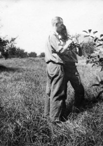 Instructor Wood & Student in School Orchard, 1931