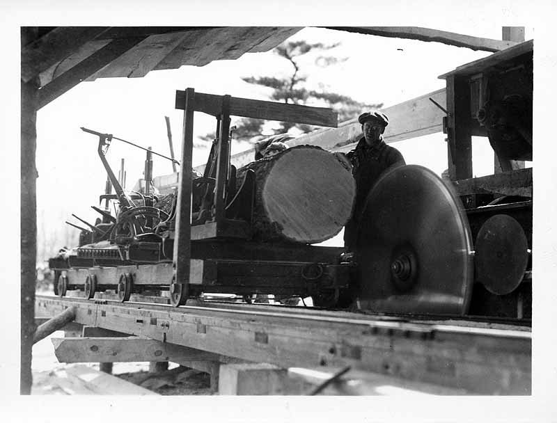 The Big Saw of the Daniels (Rowley) Mill at Aggie. This Was Sawing 1938 Hurricane Lumber. The School Trees Amounted to 60,000 Feet. Neighboring Farmers Hauled in Enough Logs to Make 90,000 More Feet