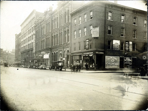 Essex St. south side at Amesbury St.; Opera House (2 copies; C.H. Armitage, eyesight specialists; Central Taxi Service; Western Union