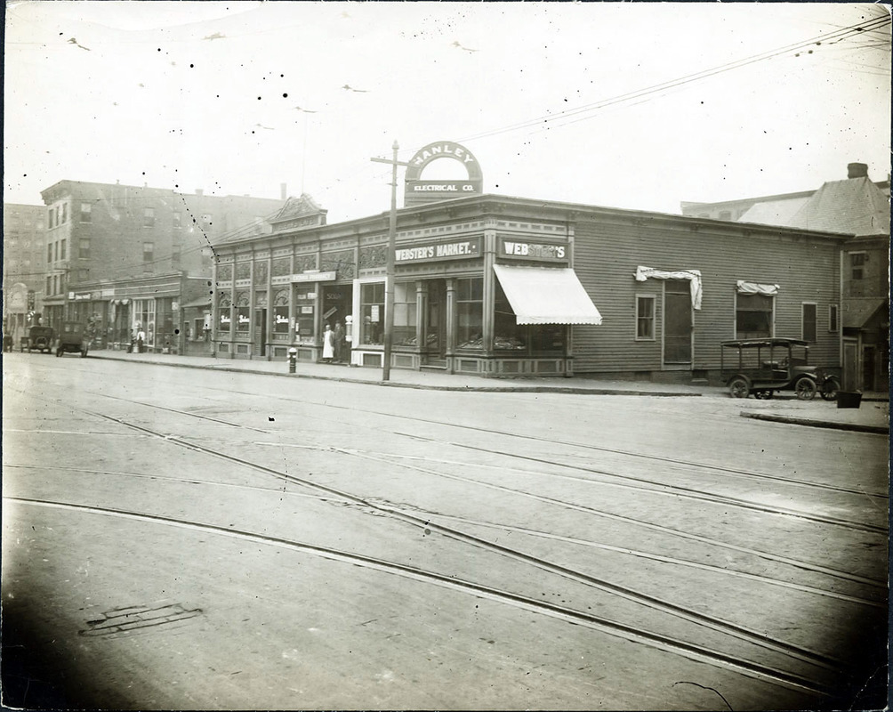 Essex St., south side at Newbury St.; Webster's Market; Hanley Electrical Co.; Boehm's Caf├⌐