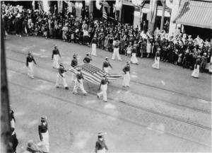 Women carrying US flag