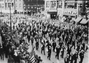 Men carrying small US flags