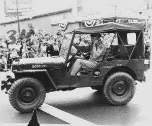 Military officer in jeep