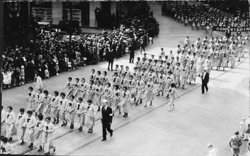 Women with ribbons and flags