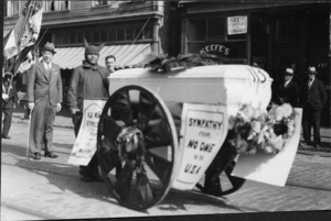 Coffin on large wheels