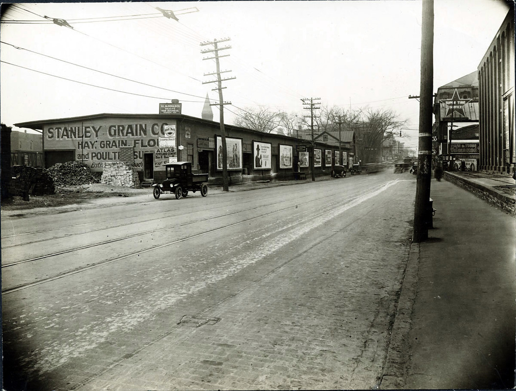 Broadway west side looking north from Water St. (2 copies); Stanley Grain Co.; Super Tire Service