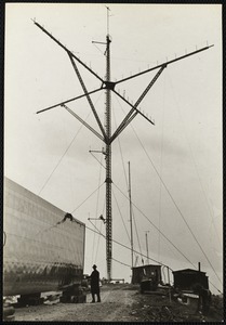 Blades and anemometer masts. If you look closely you will see the anemometers on the cross areas and trace where man is sitting, also above him.