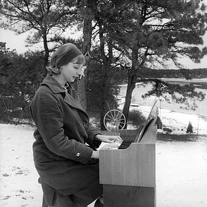 Woman playing piano, Cape Cod, Orleans, MA