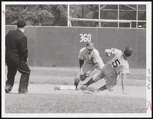 Sliding Whitey Bruhm Lynn Class 6th inn out 2d steal try. Paul Casilli, 2b Cath Mem waiting to tag. Ump Joe Kelleher at B.C.